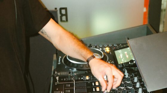 How do DJs coordinate joint podcast episodes or series with other DJs on social media?